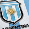 阿根廷国家队队徽 - 蓝白条纹盾徽与金色太阳